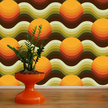 Load image into Gallery viewer, Rising sun Larbey wallpaper by 70s House manchester Estelle Bilson Bidding room, retro orange, yellow, brown and green, made in UK luxury wallpaper made in lancashire cermanic tiger leopard by Dogwood Lifestyle monstera cheese plant 70s vintage retro spaceage bohemian boho hippie 60s funky