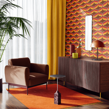 Load image into Gallery viewer, 70s retro wallpaper with orange, yellow and red swirls on a chocolate background