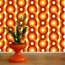 Load image into Gallery viewer, Circles Yootha Supergraphic wallpaper by 70s House manchester Estelle Bilson Bidding room, retro orange, yellow, brown and made in UK luxury wallpaper made in lancashire cermanic tiger leopard by Dogwood Lifestyle monstera cheese plant 70s vintage retro spaceage bohemian boho hippie 60s