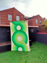 Load image into Gallery viewer, light green, apple green, green, dark green swirling 70s retro wallpaper called Yootha Pale Green 70s retro mid century style kitchen tea towel