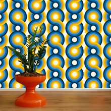 Load image into Gallery viewer, blue orange yellow  swirling 70s retro wallpaper called Yootha Pale Green 70s retro mid century style wallpaper

