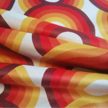 Load image into Gallery viewer, yellow, red, brown and orange swirling 70s retro wallpaper called Yootha tangerine 70s retro mid century style upholstery velvet 
