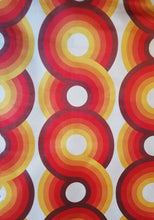Load image into Gallery viewer, yellow, red, brown and orange swirling 70s retro wallpaper called Yootha tangerine 70s retro mid century style upholstery velvet
